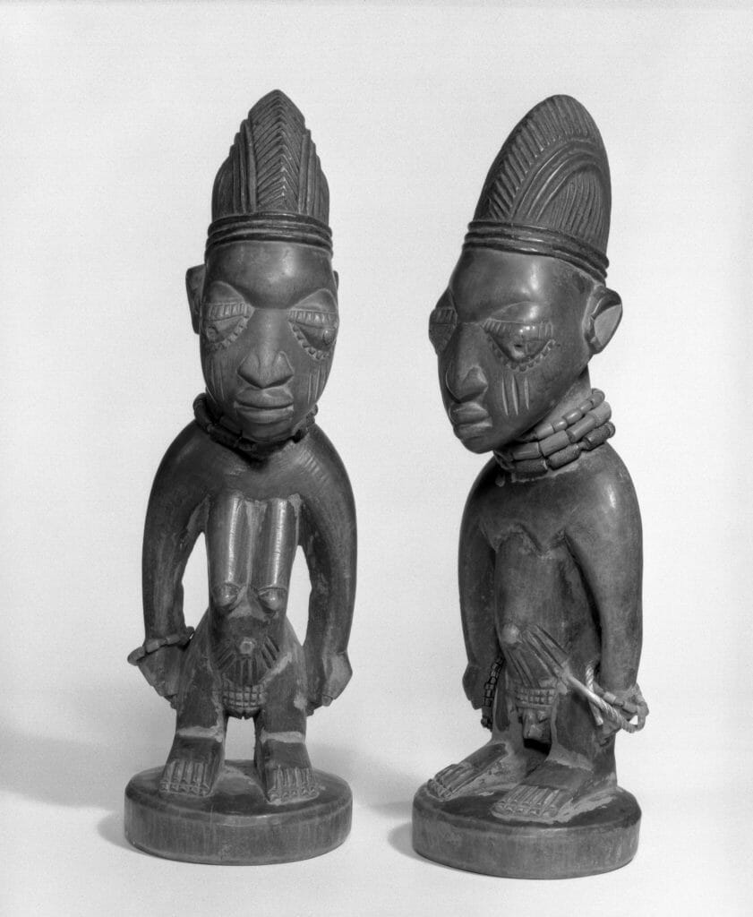 Ere Ibeji, commemorative sculptures of twins. Yoruba culture, late 19th-early 20th century. Figures held by Brooklyn Museum, New York, USA.
